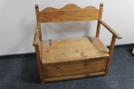 A pine monks bench CONDITION REPORT: 95cm wide by 60cm deep by 94cm high.