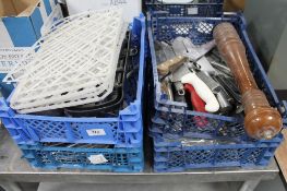 Four baskets of stainless steel cutlery,