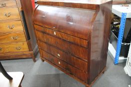 A 19th century mahogany cylinder bureau.