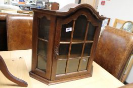 An oak display cabinet