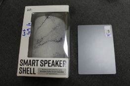 Apple : A Track Pad, without box or cables,