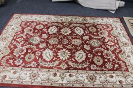 A contemporary deep pile Persian design carpet