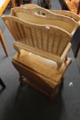 A light oak mag rack and a flap sided coffee table.