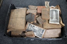 A crate of antique printing blocks relating to Newcastle upon Tyne
