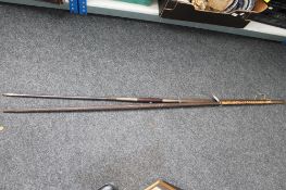 A wooden African spear together with a further metal spear