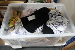 A large crate of new clothing