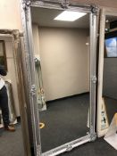 A rectangular silvered mirror 100 cm x 200 cm