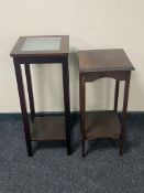 An oak Edwardian pedestal plant stand together with a further glass topped pedestal