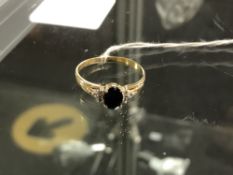 An 18ct gold sapphire and diamond ring, size U CONDITION REPORT: 3.