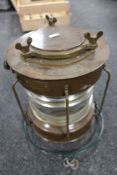 A copper ship's lamp