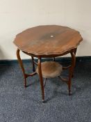 An Edwardian mahogany occasional table