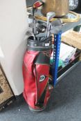 A Dunlop golf bag containing clubs