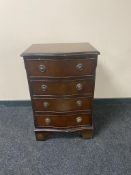 A reproduction mahogany four drawer bow fronted chest