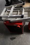 A folding aluminium step ladder and electric heater