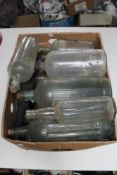 A box of antique and later glass bottles