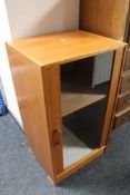 A contemporary teak audio cabinet