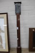 A mahogany stick barometer