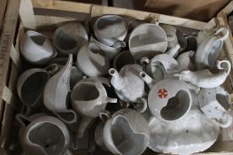 A collection of antique invalid feeding bowls.