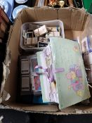 A box of cigarette and tea cards