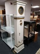 An early twentieth century painted longcased clock