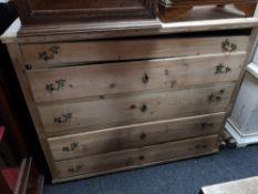 A nineteenth century pine five drawer chest