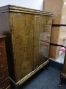 An early twentieth century double door side cabinet