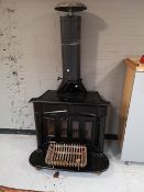 A cast iron log burner with flue