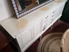 A mid century sideboard fitted with four drawers.
