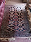 An Eastern carpet on peach ground.