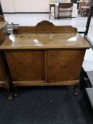 A mid century double door cabinet