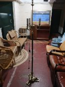 A heavy quantity brass standard lamp.