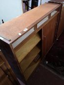 A mid 20th century teak shutter door cabinet.