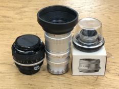 A Nikon Nikkor 55mm 1:12 camera lens numbered 415540,