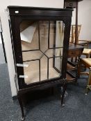 An Edwardian glazed cabinet