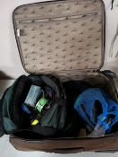 A suitcase of reels,