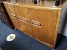 An early twentieth century oak sideboard