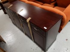 A reproduction mahogany sideboard