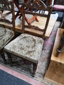 A set of four Edwardian dining chairs