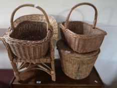 A collection of wicker ware - three baskets and a small chair.