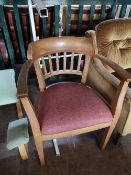 An early 20th century oak armchair.