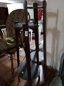 Two mid century wooden plant stands.