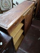 A mid 20th century teak shutter door cabinet.