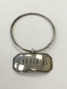 A rare Georgian silver decanter label for Shrub