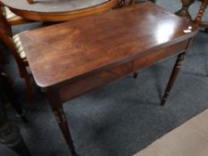 A Victorian mahogany tea table