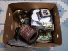 A box of vintage metal tin, brass lamp,