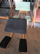 Two Scandinavian office kneeler chairs.