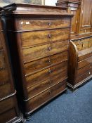 A nineteenth century mahogany seven drawer chest