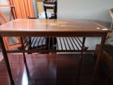 An inlaid mahogany coffee table with undershelf.