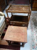 A mahogany trolley and storage stool