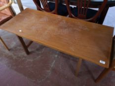 A teak mid century coffee table.